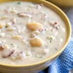 Instant Pot Simple Potato Soup is a creamy, savory potato soup recipe that is easy to make and tastes delicious. Pressure Cooker potato soup is comforting and simply tasty. simplyhappyfoodie.com #instantpotrecipes #instantpotpotatosoup #instantpotsoup #pressurecookerpotatosoup