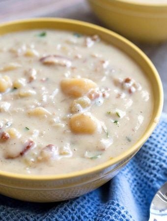 Instant Pot Simple Potato Soup is a creamy, savory potato soup recipe that is easy to make and tastes delicious. Pressure Cooker potato soup is comforting and simply tasty. simplyhappyfoodie.com #instantpotrecipes #instantpotpotatosoup #instantpotsoup #pressurecookerpotatosoup