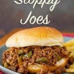 Instant Pot Sloppy Joes on a bun on green plate