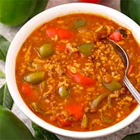 Instant Pot Stuffed Pepper Soup in a white bowl with a silver spoon