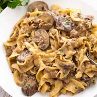 Instant Pot Hamburger Stroganoff on a white plate