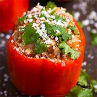 Closeup of Instant Pot Mexican Stuffed Peppers on black plate