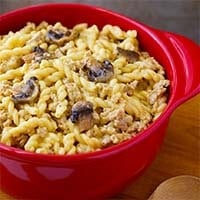Instant Pot Cheeseburger Pasta in a red bowl