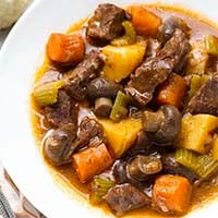 Sandys Instant Pot Beef Stew in a white bowl