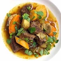 Instant Pot Paleo Beef Soup in a white bowl