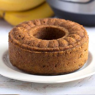 Instant Pot Banana Bread is sweet, tender, and so delicious. All you need is three ripe bananas, and you are on your way to a delicious banana bread. Pressure cooker banana bread is really easy to make and will bring memories of home. simplyhappyfoodie.com #instantpotrecipes #instantpotbananabread #pressurecookerbananabread