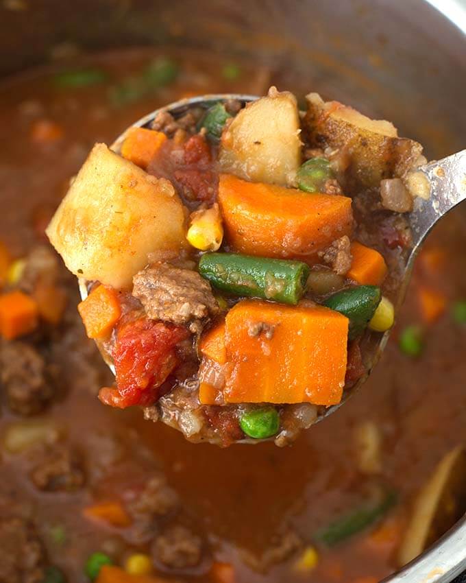 Closeup of spoonful of Hamburger Soup