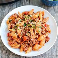 Instant Pot Pasta with Meat Sauce on a white plate