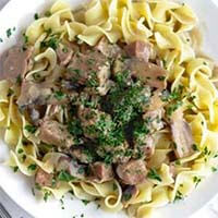 Instant Pot Beef Stroganoff on a white plate