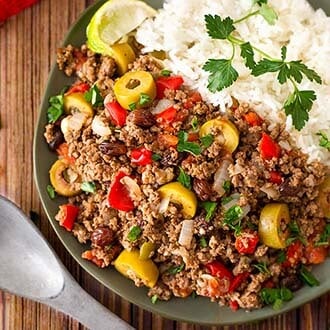 Picadillo with rice on a gray plate