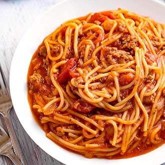 Spaghetti in a white bowl