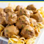 Instant Pot Swedish Meatballs on a white plate with noodles