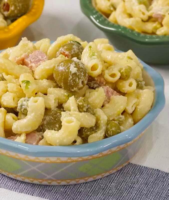 macaroni salad in a blue patterned bowl