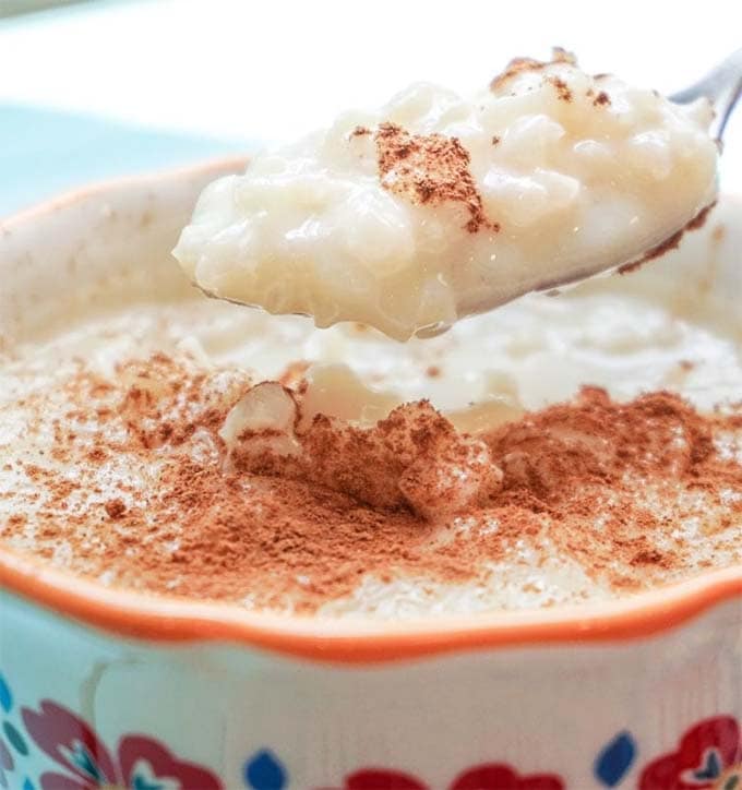 closeup of spoonful of arroz con leche