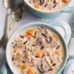 Top view of Wild Rice Soup with Chicken in a blue bowl