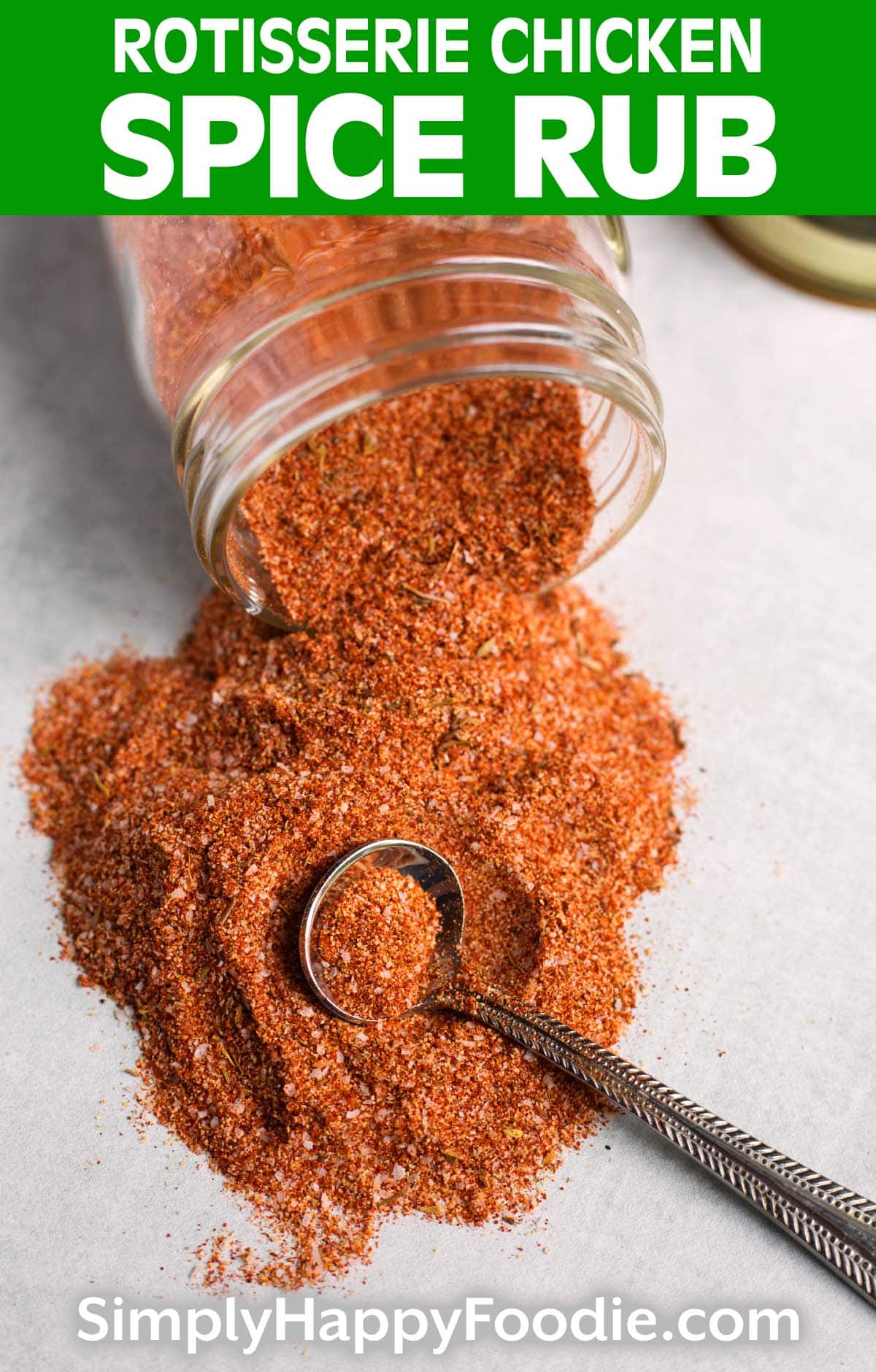 Rotisserie Chicken Spice Rub spilling from a jar