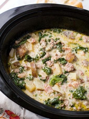 Zuppa Toscana Sausage Potato Soup in a black slow cooker