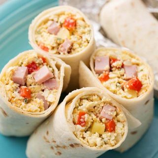 Instant Pot Breakfast Burritos are so good, and easy to make. You can customize these pressure cooker breakfast burritos any way you want. These delicious Instant Pot egg burritos are good for meal prep. simplyhappyfoodie.com instant pot recipes #instantpotrecipes #instantpotbreakfastburritos #pressurecookerbreakfastburritos