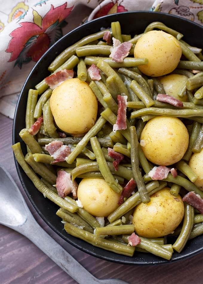 Green Beans with New Potatoes and Bacon in a black bowl