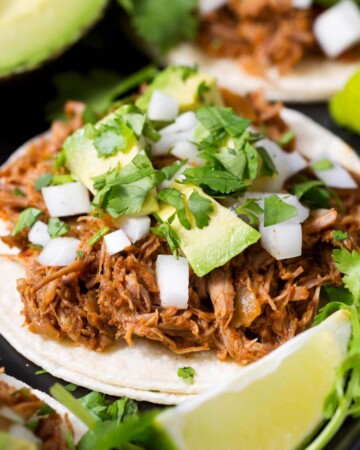 Slow Cooker Barbacoa Beef on a tortilla