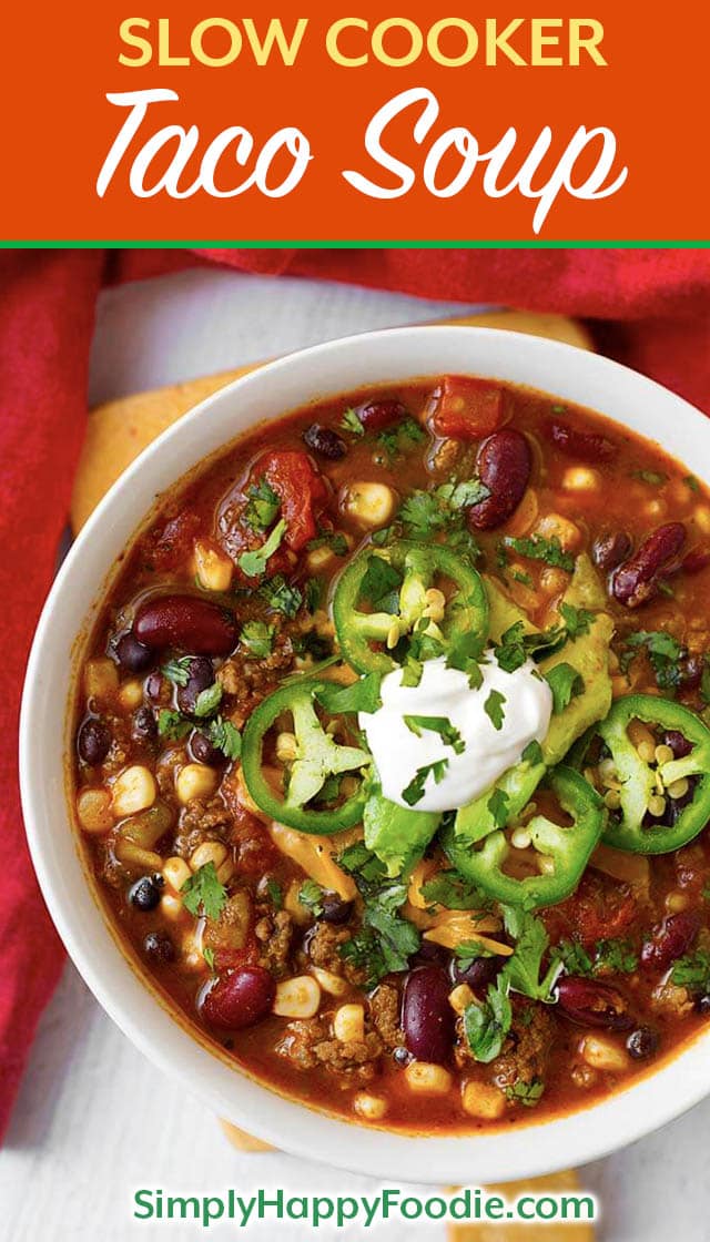 Slow Cooker Taco Soup is tasty Mexican soup that uses up some of the canned goods that are hanging out in your pantry. With beans, corn, ground beef or turkey, and some flavorings, you can easily make this delicious crock pot Taco Soup! simplyhappyfoodie.com #tacosoup #slowcookertacosoup #crockpottacosoup Crock Pot recipes and Slow cooker recipes