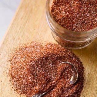 Baked chicken spice rub on a cutting board