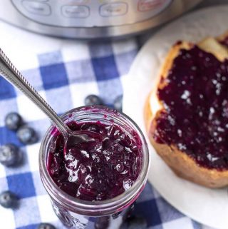 Instant Pot Blueberry Jam is easy to make and delicious! Make this pressure cooker blueberry jam in minutes. simplyhappyfoodie.com #instantpotrecipes #instantpotblueberryjam #instantpotjam #pressurecookerblueberryjam Easy Instant Pot Jam recipe, how to make jam in the Instant Pot