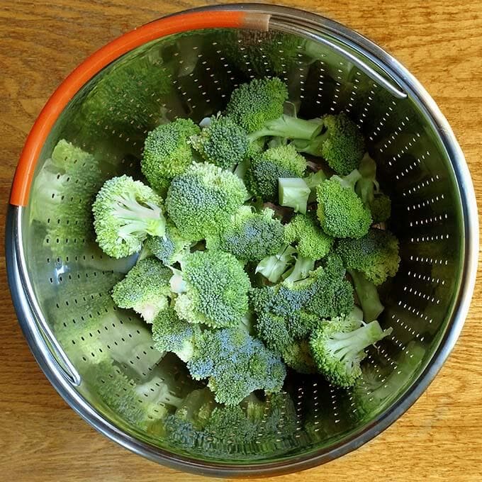 Raw Broccoli in a steamer basket