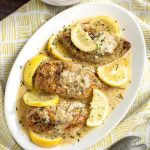 Creamy Lemon Chicken Breasts on a white platter