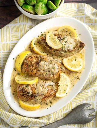 Creamy Lemon Chicken Breasts on a white platter