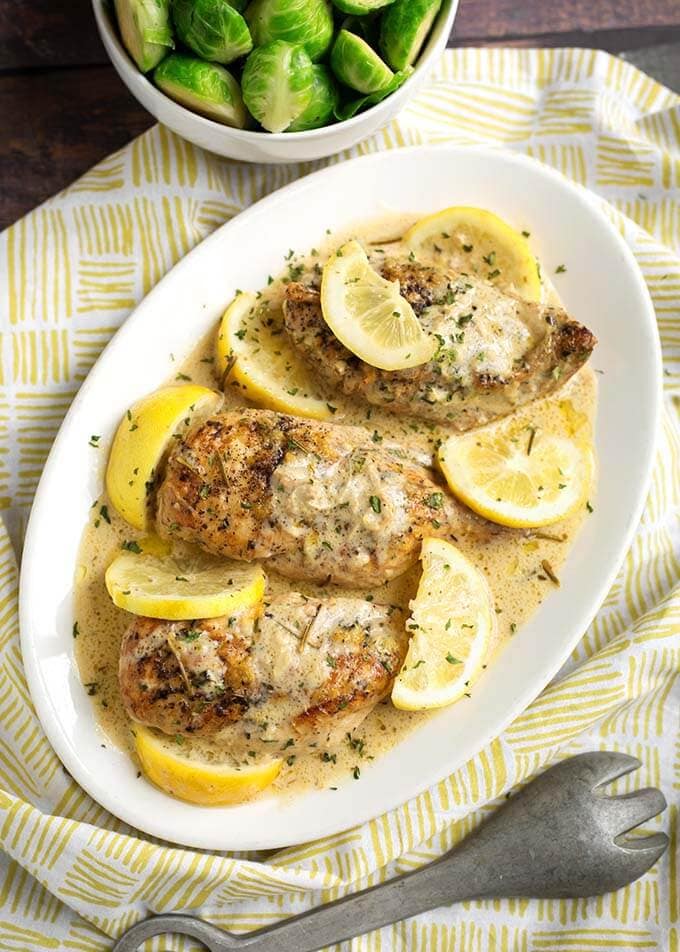 Creamy Lemon Chicken Breasts on a white platter