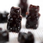 These Elderberry Syrup Gummies are a tasty and sweet way to get a dose of Elderberry Syrup. Elderberry Syrup is believed to be a great antioxidant, and a natural remedy for warding off colds and the flu! Elderberry Syrup Gummies have ingredients to enhance the flavor, and they also have potential health benefits. Great for kids! simplyhappyfoodie.com #elderberrysyrupgummies #elderberrysyrupgummybears