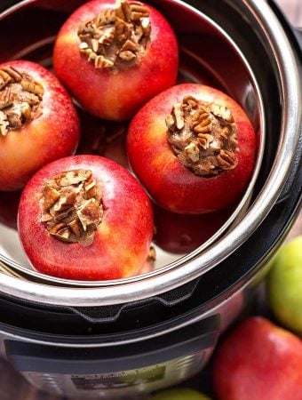 Four Baked Apples in a pot inside of a pressure cooker