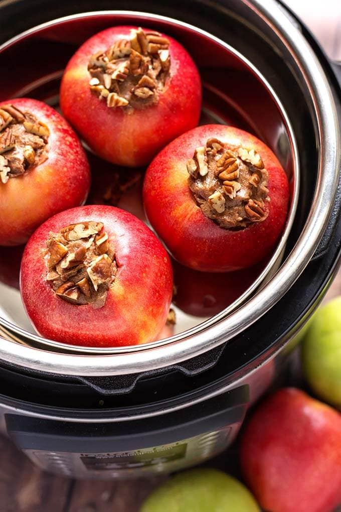 Four Baked Apples in a pot inside of a pressure cooker