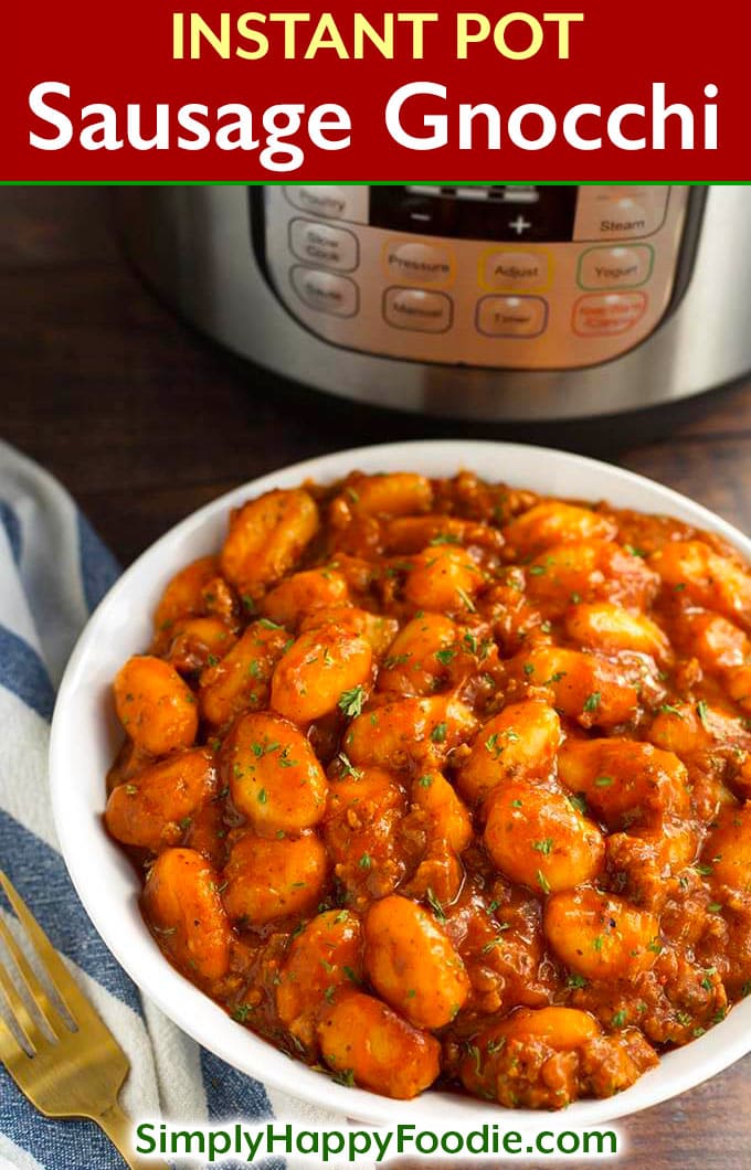 Instant Pot Sausage Gnocchi is a rich, hearty dish that has lots of flavor, and is so delicious, especially when you need a bowl of comfort food. This pressure cooker sausage and gnocchi is cooked in a tomato sauce with Italian spices, and is ready in under an hour! One of my top 5 Instant Pot recipes. simplyhappyfoodie.com #instantpotsausagegnocchi #instantpotrecipes #pressurecookerrecipes #italiangnocchirecipe