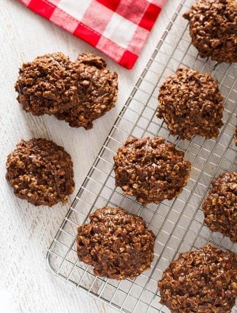 Several Chocolate Peanut Butter No Bake Cookies on a wire cooling rack