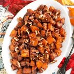 Cinnamon Roasted Butternut Squash is a delicious side dish recipe that is perfect for Thanksgiving, or any holiday. The warm spice of the cinnamon and caramelized brown sugar transforms the butternut squash into a special vegetable side dish! simplyhappyfoodie.com #butternutsquash #thanksgivingsidedish
