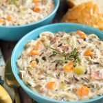 Crock Pot Creamy Chicken Wild Rice Soup is delicious, thick, rich, and so simple to make! Slow cooker creamy chicken wild rice soup is a hearty one pot meal that is perfect for Fall. My whole family loves this soup! simplyhappyfoodie.com #wildricesoup #crockpotchickenwildricesoup #slowcookerwildricesoup