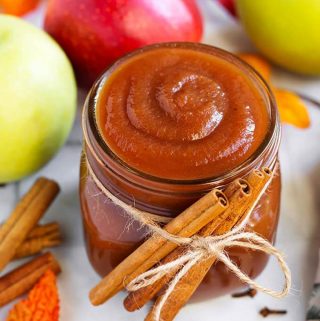 Instant Pot Apple Butter is absolutely divine! This recipe is everything good about Fall, in one sweetly spiced condiment! Pressure Cooker Apple Butter is easy to make in your Instant Pot, and the results are a smooth, velvety, Autumn spread that is delicious on toast, muffins, pancakes, and by the spoonful! Instant Pot Recipes by simplyhappyfoodie.com #instantpotapplebutter #pressurecookerapplebutter