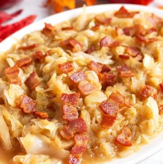 Instant Pot Braised Cabbage and Apples have a wonderful tart-sweet flavor, with a savory edge. This is a delicious recipe to make in your Instant Pot! Pressure cooker braised cabbage and apples is a Fall comfort food. A perfect Instant Pot Thanksgiving side dish! simplyhappyfoodie.com #instantpotbraisedcabbage #pressurecookerbraisedcabbage