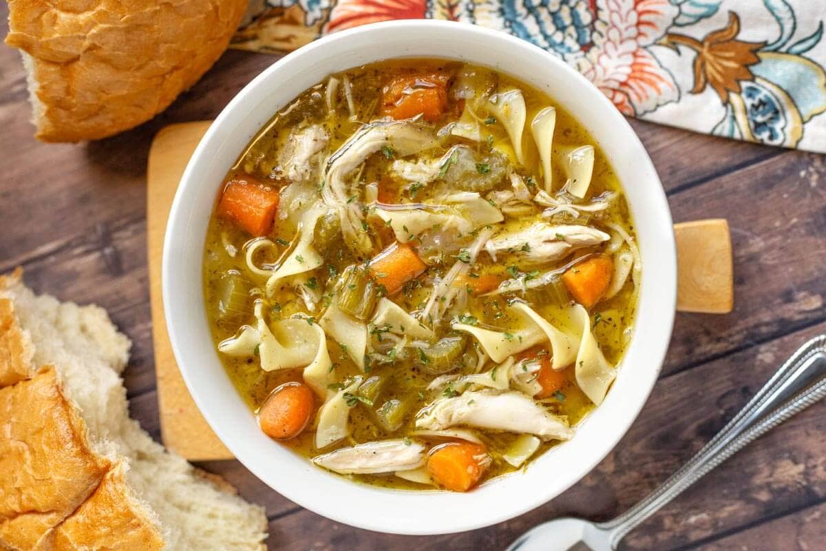 Instant Pot Chicken Soup in a white bowl.