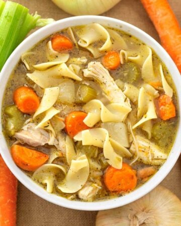 Instant Pot Chicken Noodle Soup in white bowl.