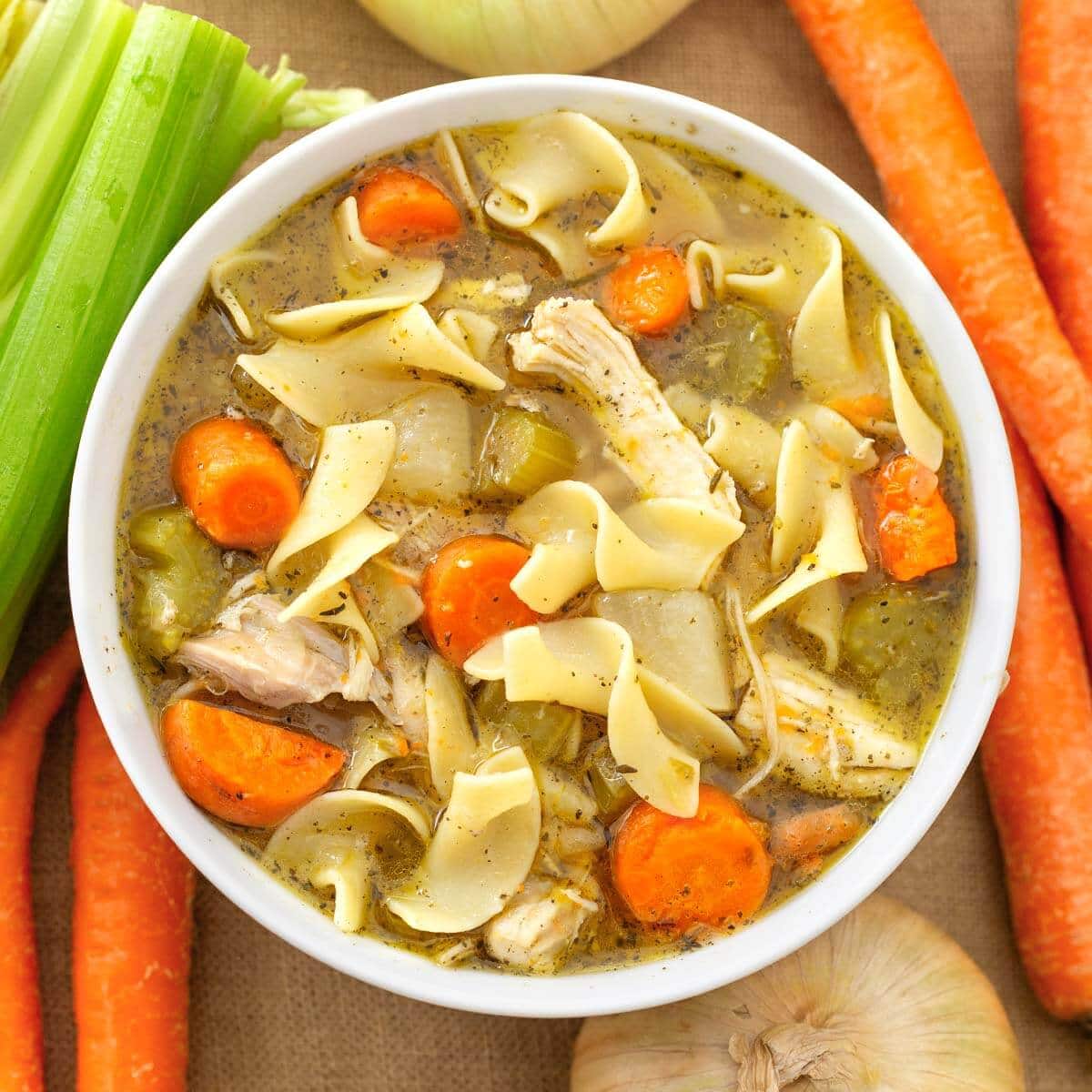 Instant Pot Chicken Noodle Soup in white bowl.