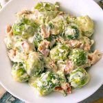 Instant Pot Creamy Bacon Brussels Sprouts are so delicious you might end up converting someone who doesn't like Brussels Sprouts! These are savory, creamy, and just the perfect texture. Pressure Cooker Creamy Bacon Brussels Sprouts are a perfect side dish for Thanksgiving, or any Holiday or special occasion. You can make these Instant Pot brussels sprouts any time! Instant Pot Recipes by simplyhappyfoodie.com #instantpotbrusselssprouts #pressurecookerbrusselssprouts #instantpotbrusselssproutsbacon