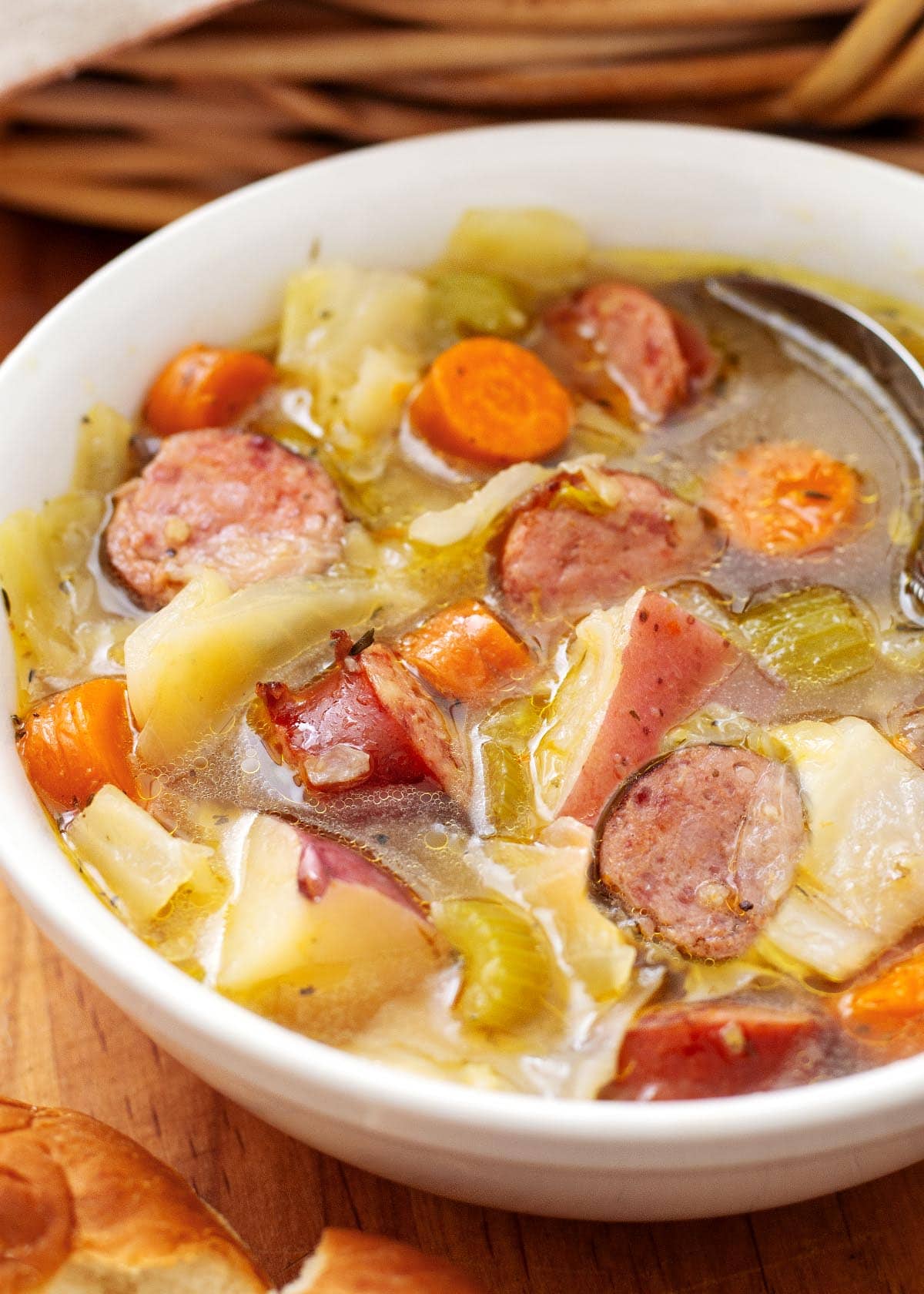 Instant Pot Kielbasa Cabbage Potato Soup in white bowl