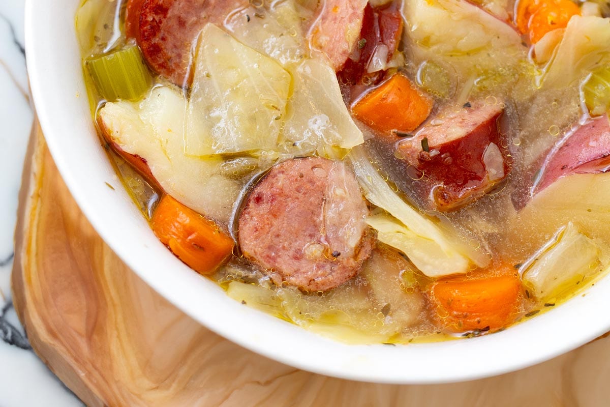 Instant Pot Kielbasa Cabbage Potato Soup in white bowl