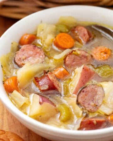 Instant Pot Kielbasa Cabbage Potato Soup in white bowl