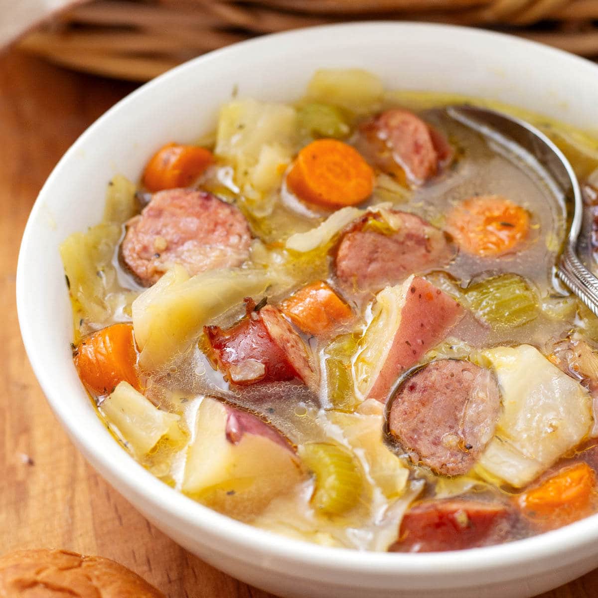 Instant Pot Kielbasa Cabbage Potato Soup in white bowl
