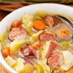 Instant Pot Kielbasa Cabbage Potato Soup in white bowl