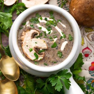 This Instant Pot Mushroom Soup recipe is wonderful and it tastes amazing! This pressure cooker mushroom soup is rich, flavorful, and creamy. Made with a variety of mushrooms, for the best mushroom flavor, you are going to enjoy this soup! Instant Pot Recipes by simplyhappyfoodie.com #instantpotmushroomsoup #pressurecookermushroomsoup